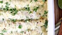 Pulled Pork Enchiladas with Creamy Green Chile Sauce Pulled Pork Enchiladas with Creamy Green Chile Sauce