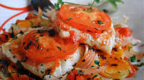 Oven-baked cod steaks with potatoes, tomatoes and onions Oven-baked cod steaks with potatoes, tomatoes and onions