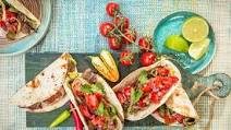 Tacos with flank steak, guacamole and pico de gallo Tacos with flank steak, guacamole and pico de gallo