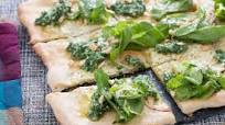 White Pizza with Arugula Pesto, Pine Nuts & Pea Tips White Pizza with Arugula Pesto, Pine Nuts & Pea Tips