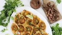 Super Nachos with Refried Beans, Cheese, and Jalapeños Super Nachos with Refried Beans, Cheese, and Jalapeños