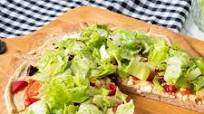 Heart Healthy Pizza topped with Simple Salad Heart Healthy Pizza topped with Simple Salad