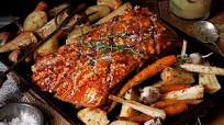 Pork belly with slow-roasted winter vegetables and apple and sage sauce Pork belly with slow-roasted winter vegetables and apple and sage sauce