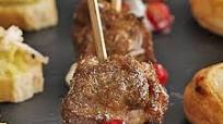 Spiced lamb skewers with pomegranate tzatziki | BBC Good Food Spiced lamb skewers with pomegranate tzatziki | BBC Good Food