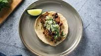 Lamb barbacoa with consomé, salsa verde and tortillas Lamb barbacoa with consomé, salsa verde and tortillas